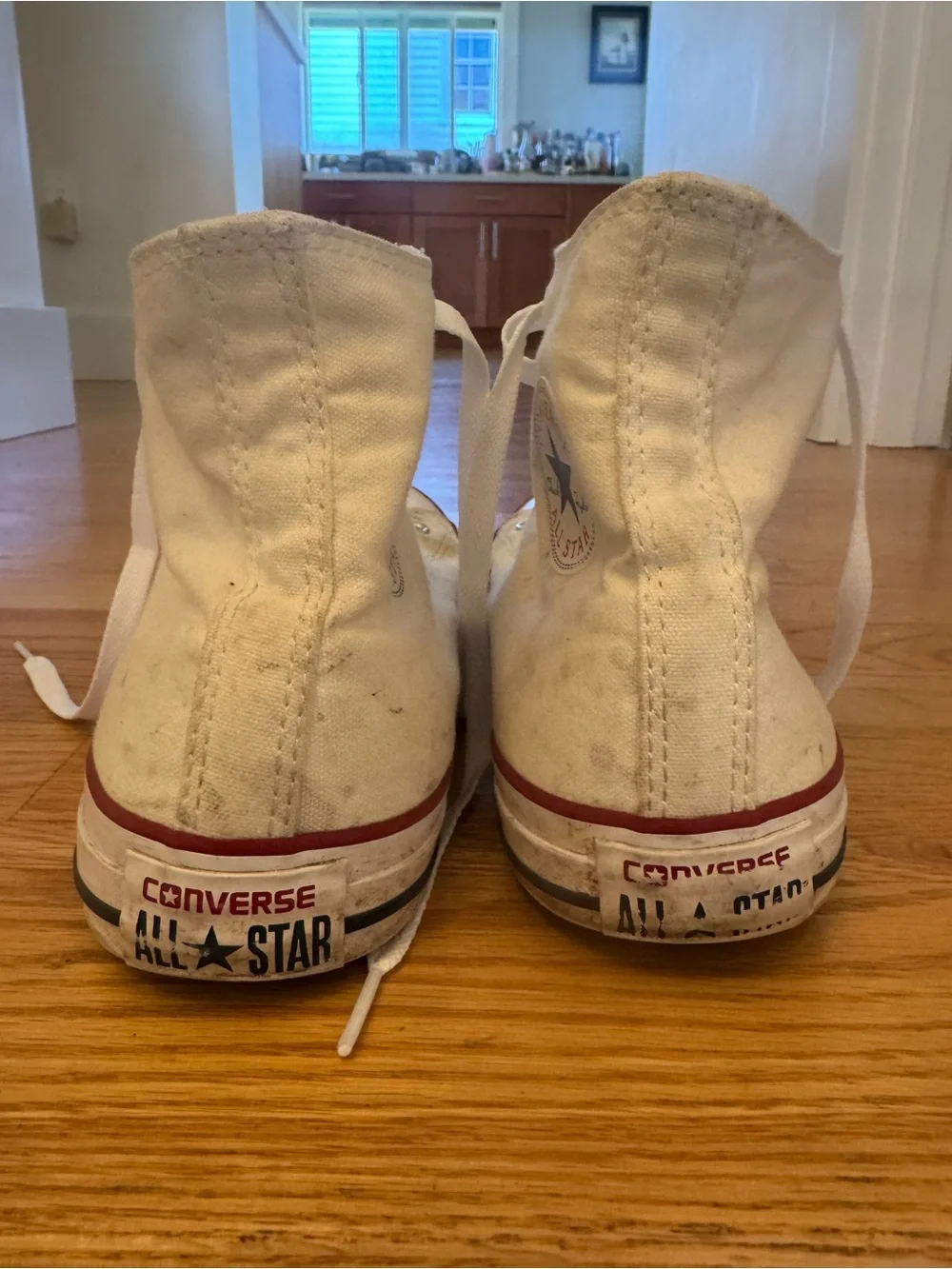 Converse White High-Top Sneakers with Red Trim